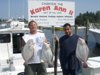 Mike and Pete with fluke from 24 in. to 27 in.