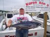 7-15 - Buck hams it up with his 40 pound yellowfin.