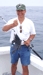 8-5 - Dennis with a nice sea bass caught while vacationing on Long Beach Island aboard our charter boat.