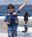 6-18 - 7-Year old Liam Kerwin with a double-header keeper catch of sea bass.