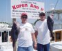 8-1 - Jim and his father, Jason, show off their biggest sea bass of the day.
