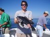 9-22 - Tom with the biggest sea bass of the day at 20 in.