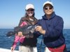 Monica and Danny with 3 lb. sea bass.